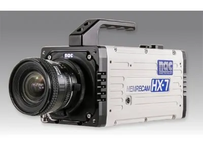 A NAC Memrecam HX camera system with essential hardware components on a studio desk.